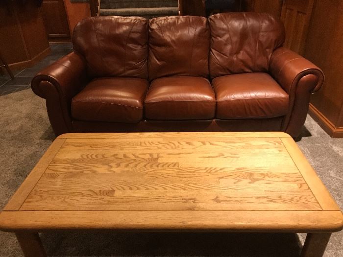 BROWN LEATHER COUCH , WOOD COFFEE TABLE 