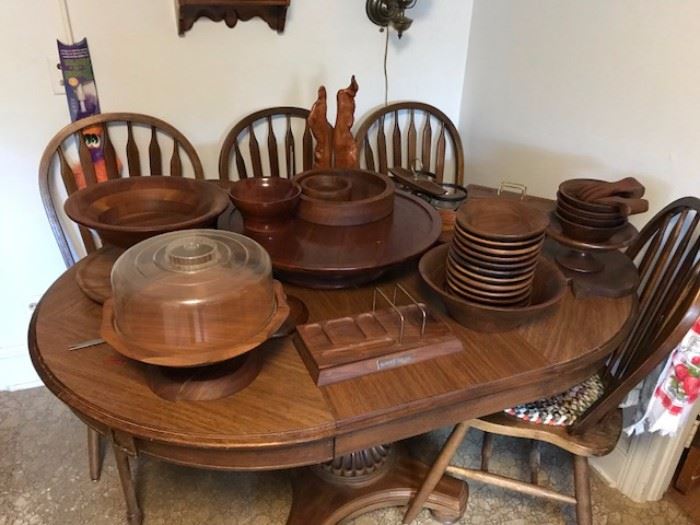 Great wooden pedestal table, 4 chairs and lots of wooden kitchen items.