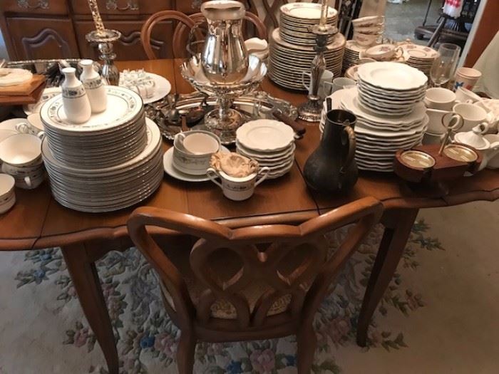 White Furniture Company "Lorraine" dining room table with leaves...loaded with china and silverplate.