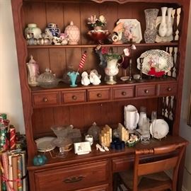 Great lighted hutch/ bookcase/kitchen china cabinet and desk, filled with vintage and antique china and glass.