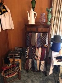 Great lingerie chest hid by a display of vintage ties.