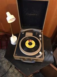 Portable record player complete with a 45 by "Little" Stevie Wonder!