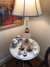 Other crystal lamp and marble top table...complete with lidded jars and florals.