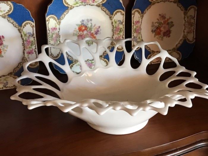 Great mid century glass bowl with set of dessert plates behind.