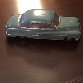 Vintage cast iron advertising bank...it's a Buick!