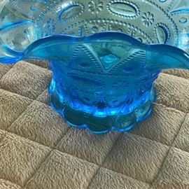 Blue pressed glass vase.