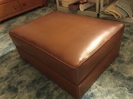 Large brown ottoman that would be a great coffee table substitute