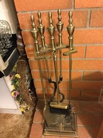 Beautiful brass fireplace set with design on base, nicest one I have seen