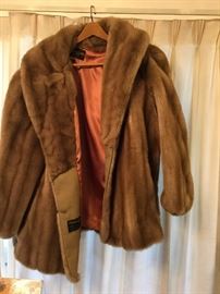 One of two faux fur jackets, well done, other is blonde mink