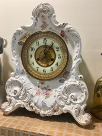 Antique clock with porcelain case