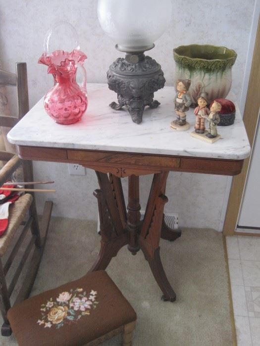 Victorian marble top stand, oil lamp & cranberry glass