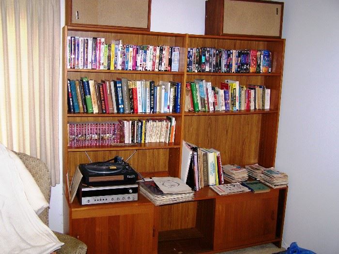 Bookshelf, books, VHS, stereo
