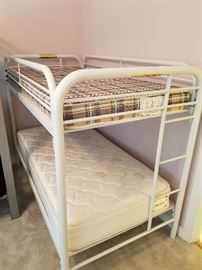 Metal bunk bed with mattresses 