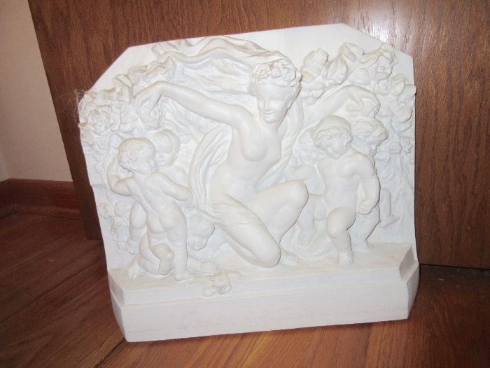 heavy plaster relief, hangs up on the wall
