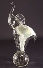 Lot 1: Solid Glass Elephant w/Trunk Up Standing On Ball