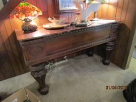Desk converted from old ornate piano