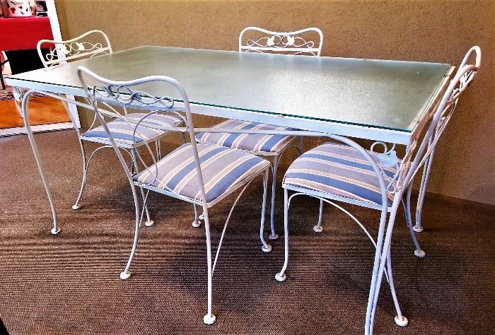 Glass top Patio Table with four chairs