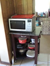 "Sharp" convection microwave oven. Microwave oven cart and lots of Dishes, pots and pans ....