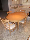 A FINE TABLE AND SIX CHAIRS.