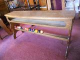 ONE OF A KIND POOL TABLE BENCH, NOTE BALLS ON BOTTOM, BEVELED FRONT. VERY FINE OAK GRAIN PRESENTATION. A MUST FOR ANY RECREATION ROOM, INCLUDED ARE THE BRAGGING RIGHTS AND BALLS, I CAN GUARANTEE NOBODY ELSE HAS THIS ONE.