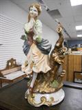 CERAMIC FIGURINE, THEIR IS A MARK ON BOTTOM
