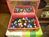 SMALL WOOD CHEST FULL OF MARBLES