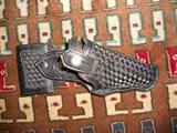 LEATHER GUN HOLSTER.