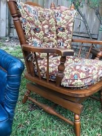 antique rocker glider. Print is Colonists meeting native Americans 