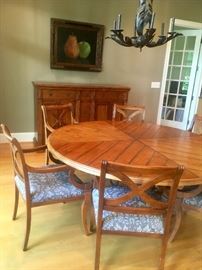 6 ft diameter table with 6 arm chairs