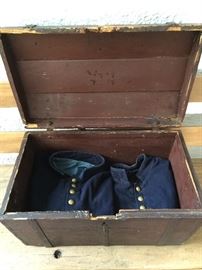 Civil War coats and stage coach trunk