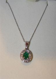 14 kt Gold, Diamonds and 1 kt Emerald