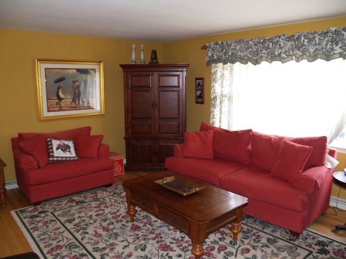 Living room set with sofa and snuggler, coffee table and end table.   Make an offer.