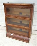 Globe Wernicke oak stacking lawyers bookcase with drawer in bottom