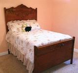 American oak highly carved antique bed