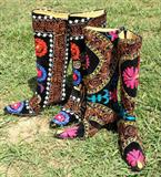 two pairs of ladies needlepoint Western boots