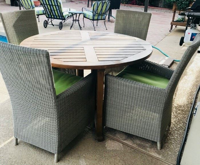 

Teakwood Dining Table with 4 Captiva Seaside Arm Chairs. (indoor/outdoor light grey resin wicker) perfect for patio dining/partying by the pool!