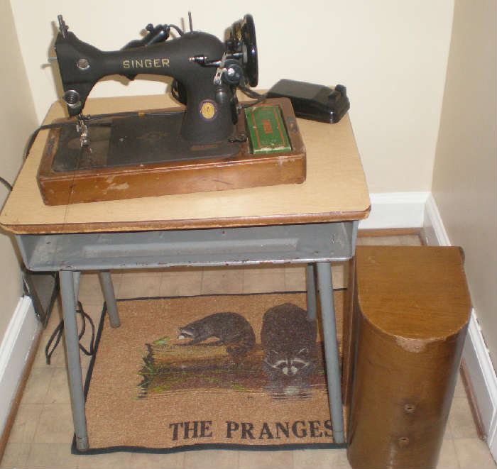 Vintage portable sewing machine, school desk, Prange doormat.