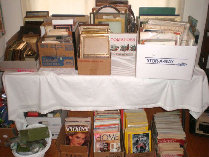 Picture frames, pictures, old photo graphes, magazines.