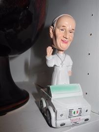 It's the Pope on his Popemobile!