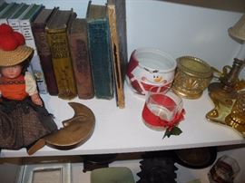 Some older books, doll, lamp