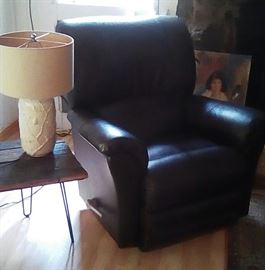 Dark brown leather Lazy Boy recliner, handmade Arkansas table on hair pin legs, lamp