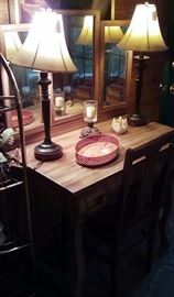 small vanity with 3 mirrors, lamps