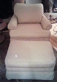 upholstered cream chair with ottoman