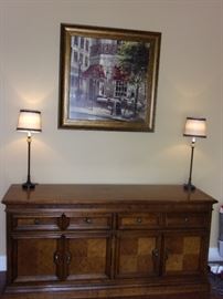 Buffet, lamps and framed art