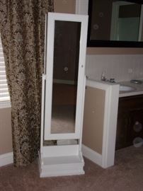 Floor mirror with jewelry amoire/storage, 360 degree rotation and lockable