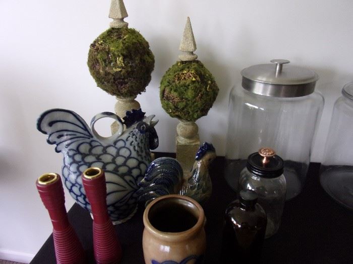 Topiaries, candlestick holders, ceramic crock style chicken piggy bank and various size glass containers