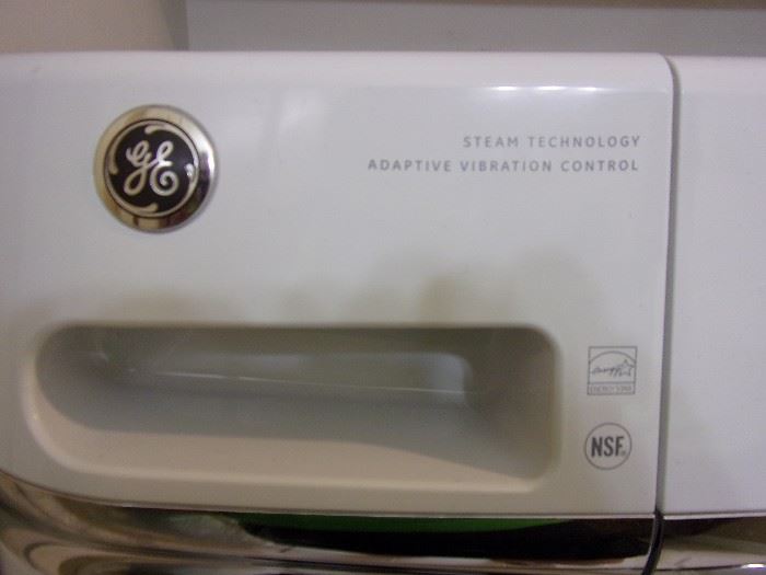 GE Washer front load 1 year old/Dryer electric with steam approx 3 years old base/no drawers