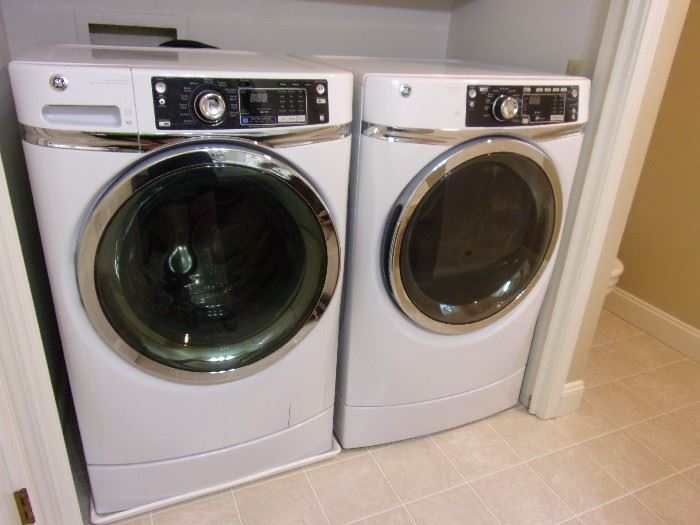 GE Washer front load 1 year old/Dryer electric with steam approx 3 years old base/no drawers