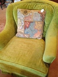 One of two vintage avocado/lime club chairs