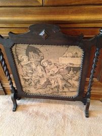 Antique barley twist firescreen with beading detail around the frame